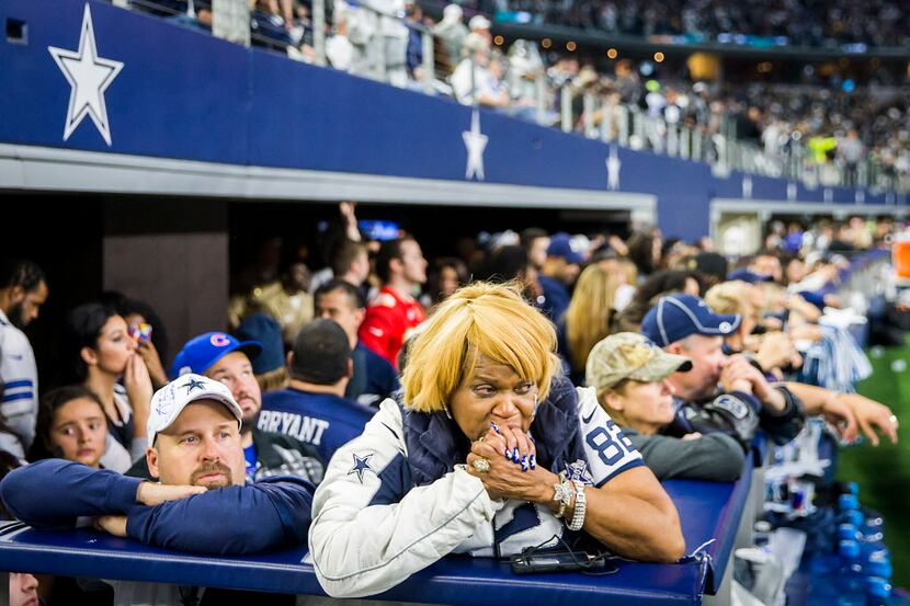 Dallas Cowboys fan Carolyn Price reacts after the  Green Bay Packers kicked a 51-yard...