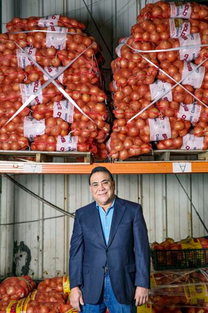 
Alfredo Duarte, president and chief executive of Taxco Produce Inc., works through the...