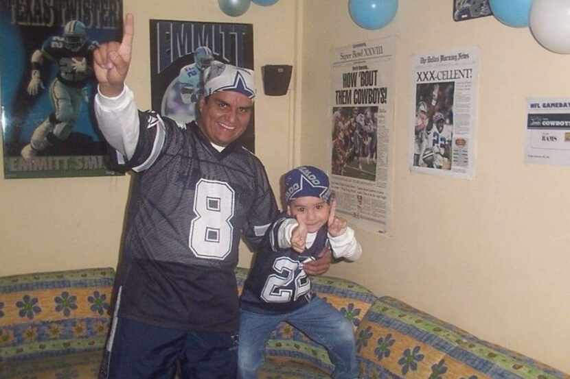 Eduardo Flores (right) loved to watch Cowboys games with his father Luis Antonio Flores, who...
