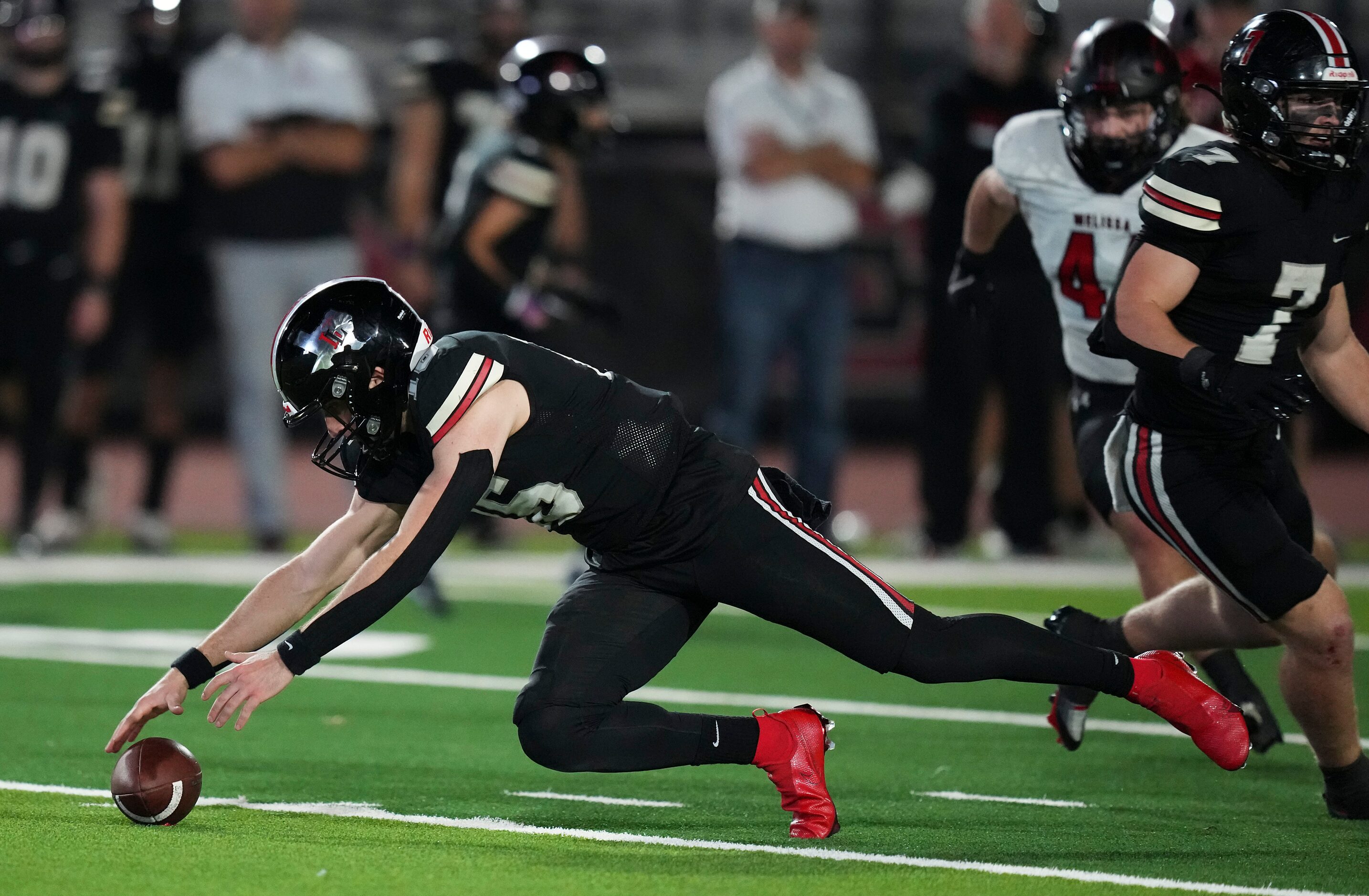 Lovejoy quarterback Brayden Hagle (16) dives to recover his own fumble during the second...