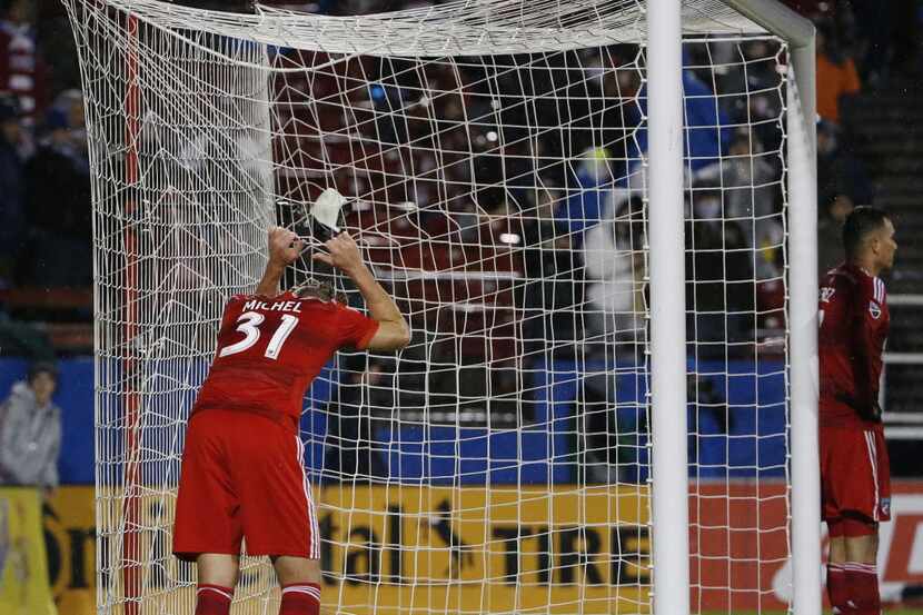 FC Dallas midfielder Michel (31) reacts after missing a last moment opportunity near the net...