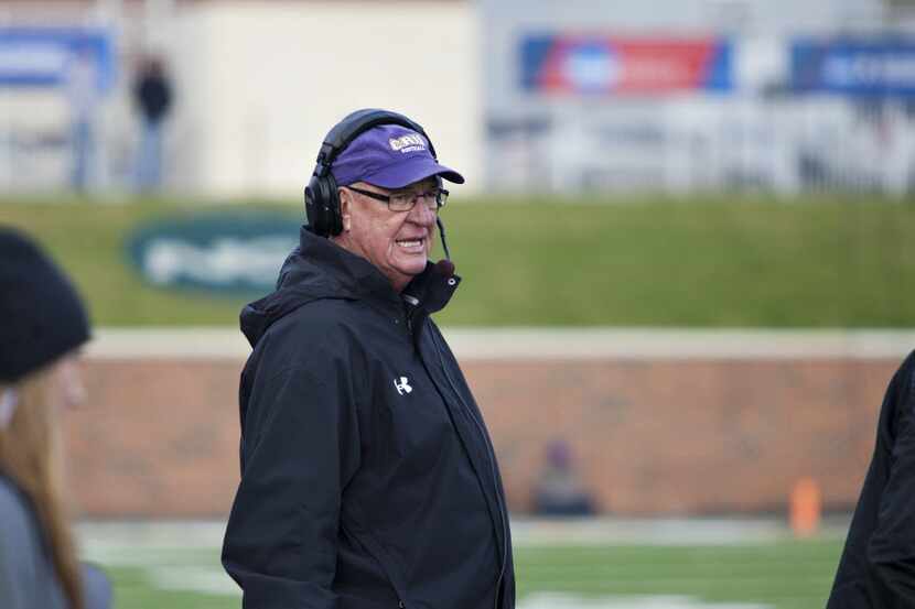 Mary Hardin-Baylor's Coach Pete Fredenburg stands on the sidelines during the...