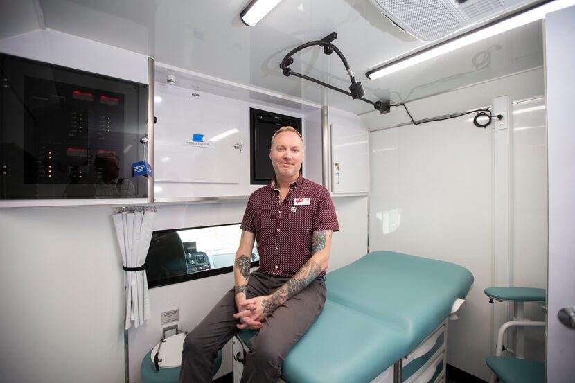 Timo Cervantez, mobile testing unit coordinator at Resource Center, is shown in an exam room...