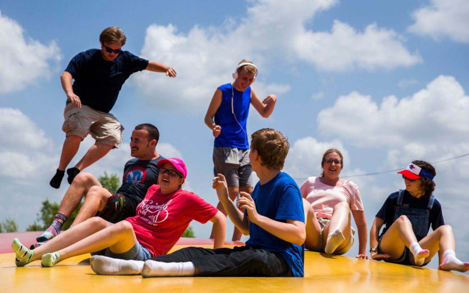 Jamie Wheeler-Matlock, second from right, Austen Wheeler,  third from left, and other...