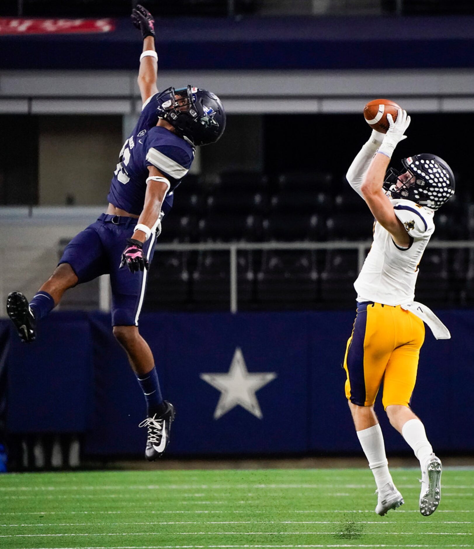 Highland Park wide receiver Drew Scott hauls in a 68-yard touchdown  pass from Chandler...