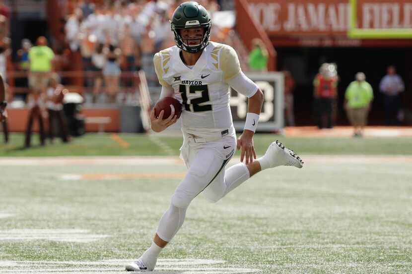 FILE - In this Saturday, Oct. 13, 2018 file photo, Baylor quarterback Charlie Brewer (12)...
