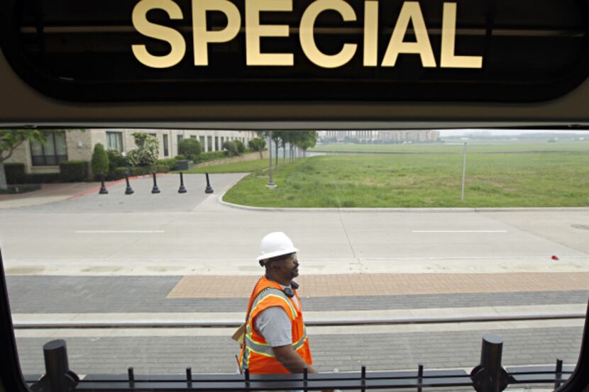 System start-up specialist Gerry King helps test the Orange Line in Irving.