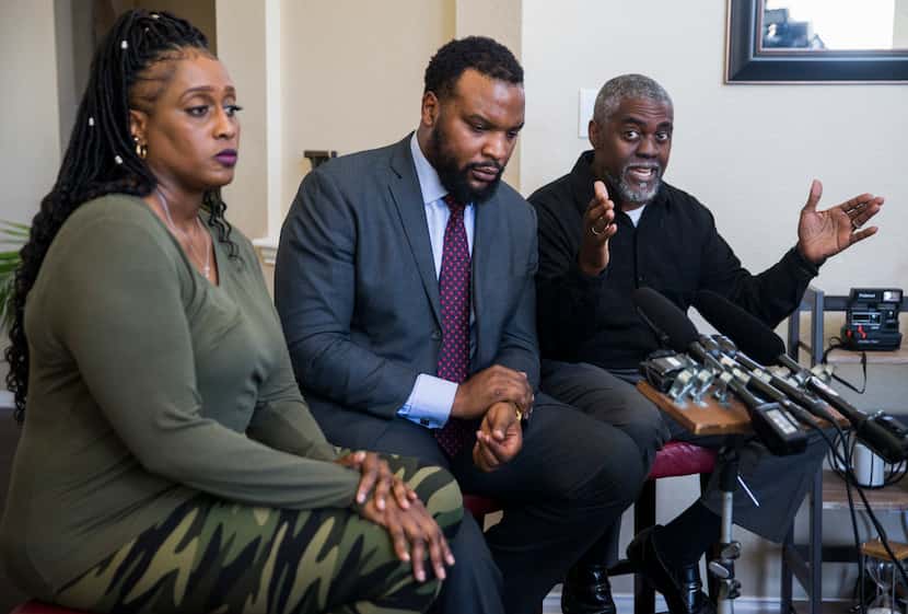 Attorney Lee Merritt (center) and Darius Tarver's parents, Froncella Reece and Kevin Tarver,...