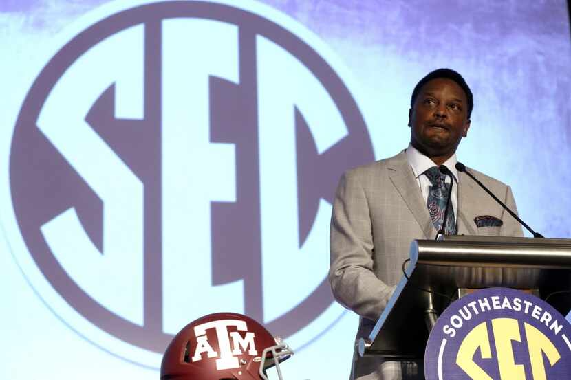 Texas A&M coach Kevin Sumlin speaks to the media at the Southeastern Conference NCAA college...