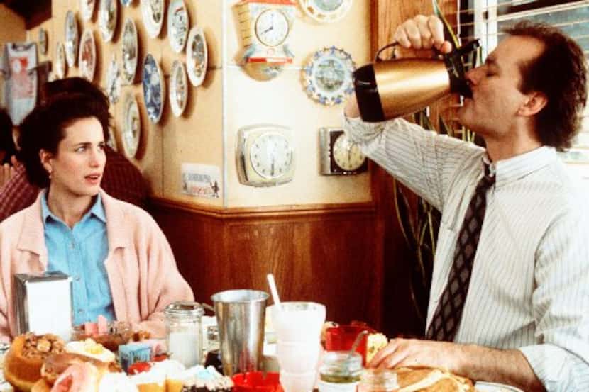 Andie MacDowell and Bill Murray star in GROUNDHOG DAY.