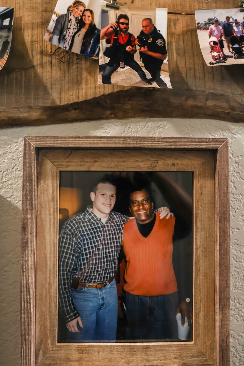 A photo of Tyler Tines Pride and Charley Pride hangs on a wall at his home in Lindale, Texas. 