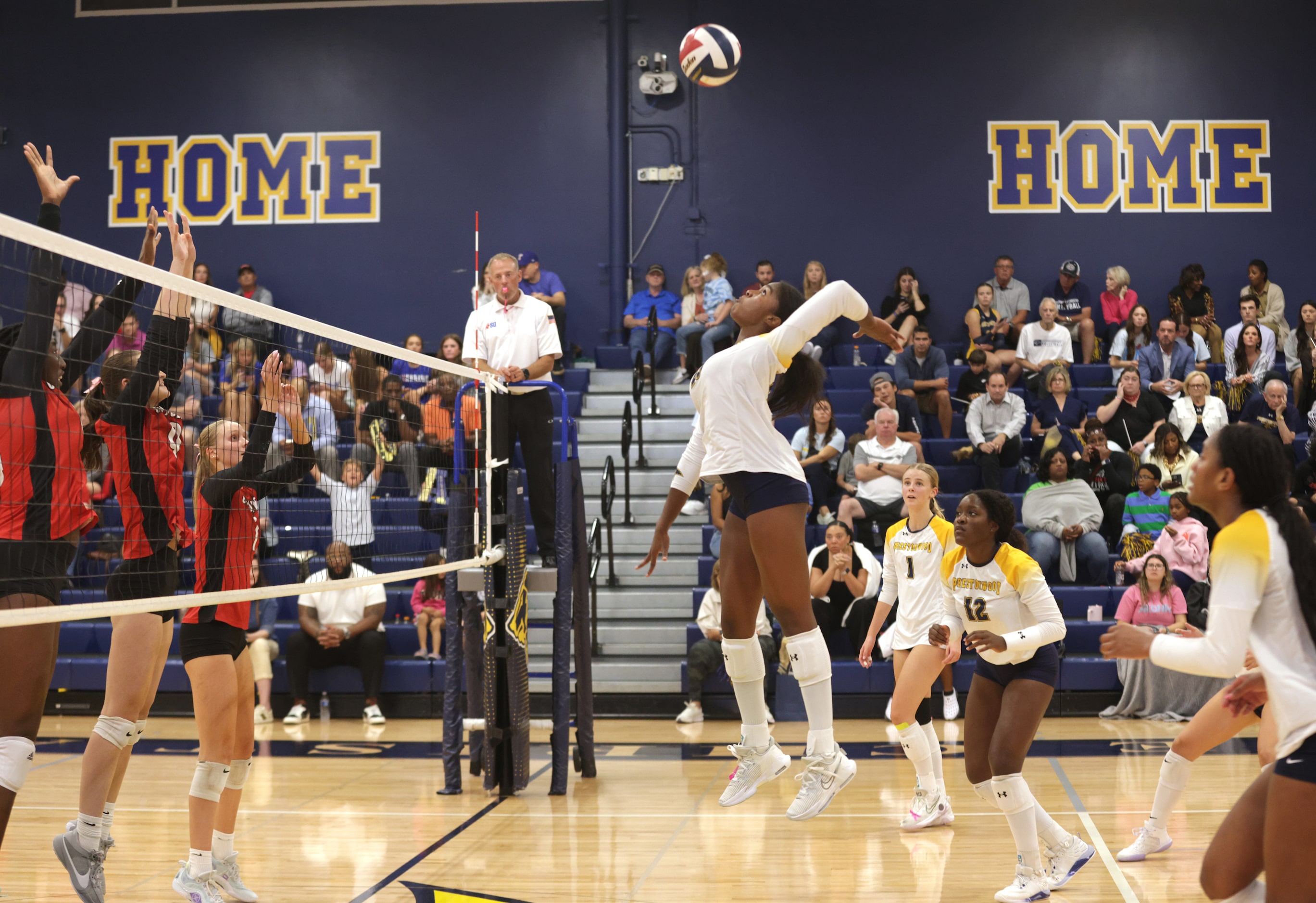 Prestonwood player #16 Taylor Clarke jumps for the ball during the Ursuline Academy of...