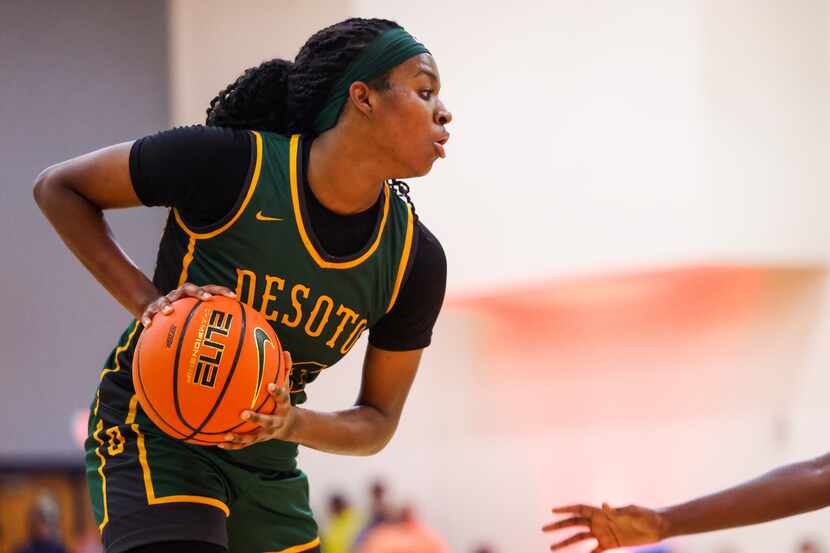 DeSoto small forward Amari Byles (24) prepares a pass during a game against Montverde...
