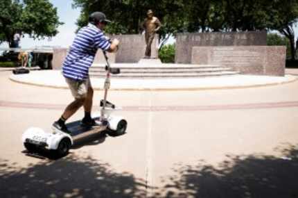  Luke Pulido of Fort Worth test drives a GolfBoard electric vehicle. The Four Seasons...