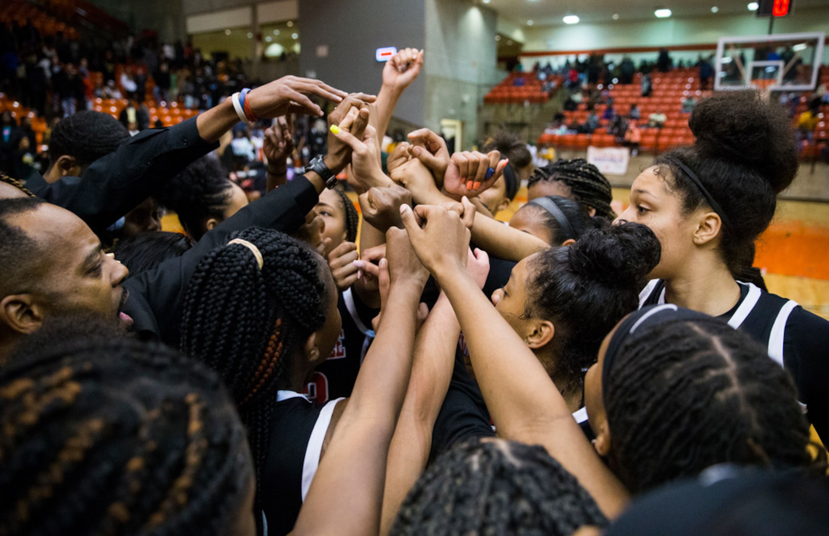 Duncanville celebrates a 47-43 win after a Class 6A Region I quarterfinal girls basketball...