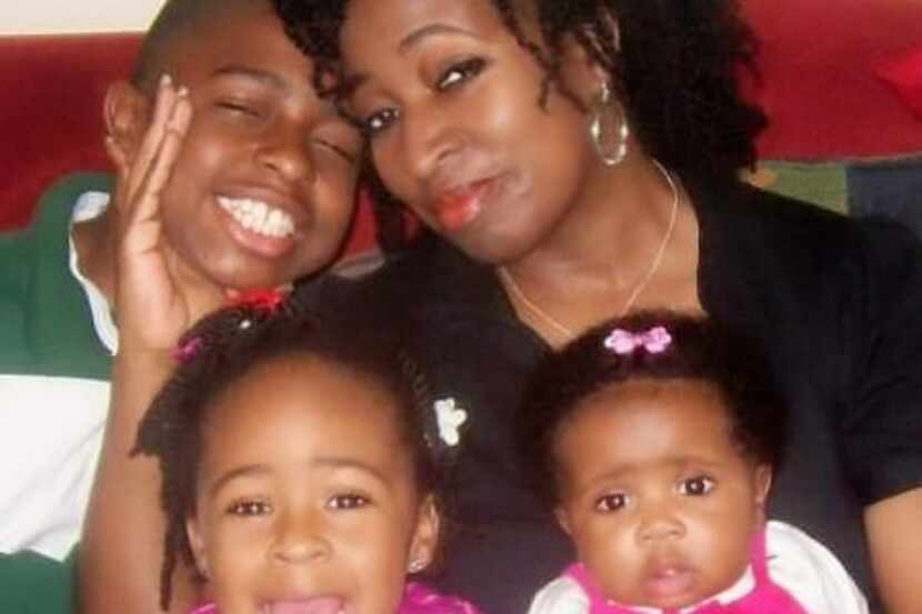 Lorrie Irby Jackson is pictured in 2009 with her children Darius, Nia (bottom left) and...