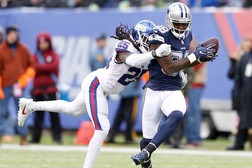 Dallas Cowboys wide receiver Dez Bryant (88) catches a pass for a 50 yard touchdown...