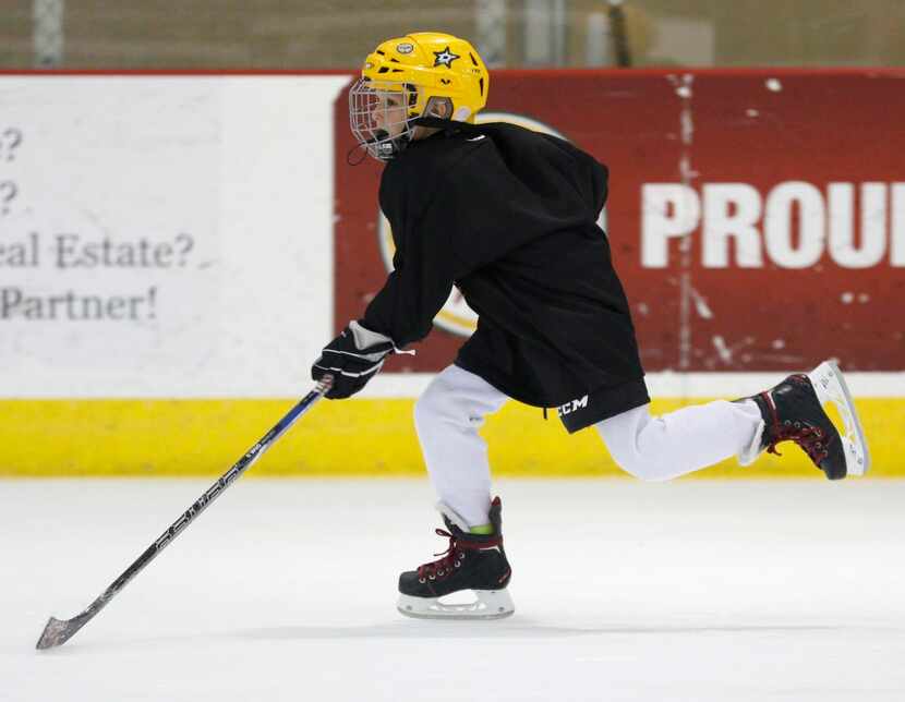 
Aiden Sandkuhler skates across the ice during a Northstar Hockey Club camp at the Allen...