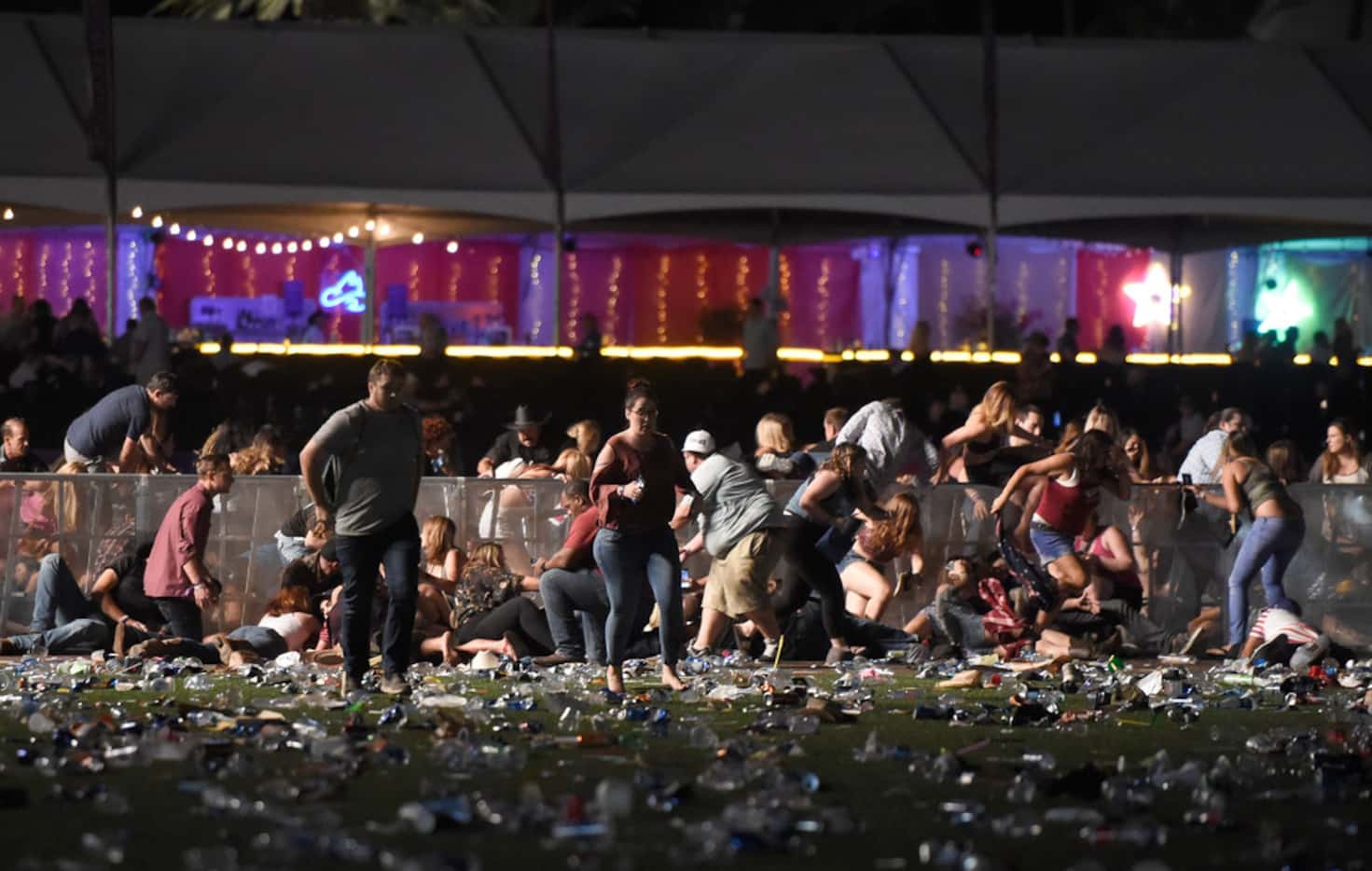 Chaos engulfed the Route 91 Harvest country music festival in Las Vegas after gunfire erupted. 