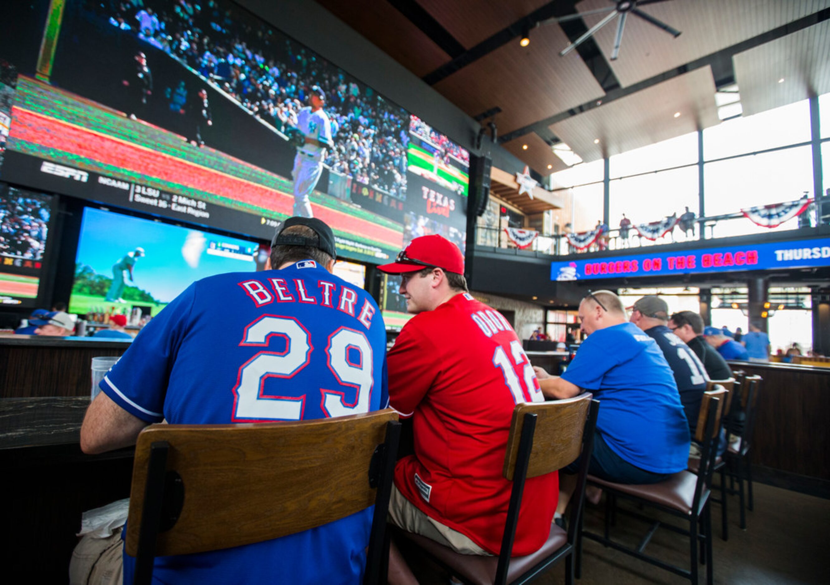 Fans celebrate Texas Rangers Opening Day with events at Texas Live! on Thursday, March 28,...