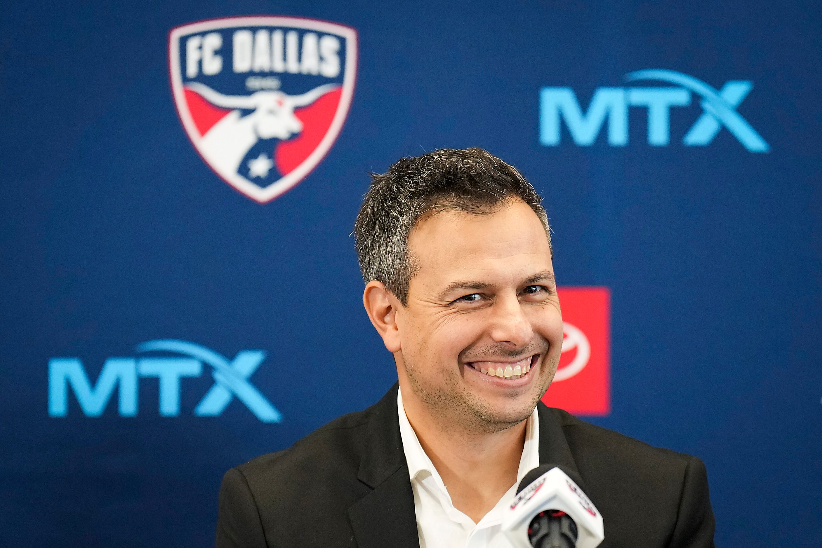 New FC Dallas head coach Nico Estévez smiles during his introductory press conference at the...