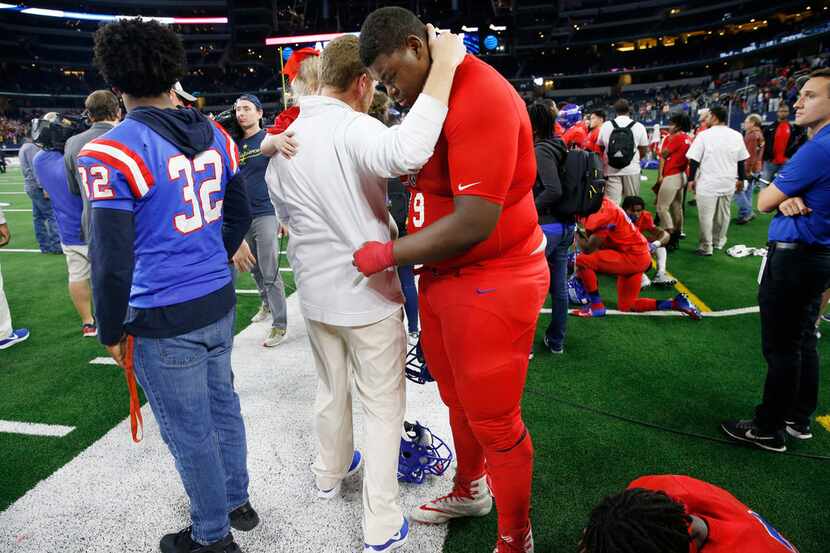 Duncanville's Jordan Phillips (79) cries on the sidelines after being beat by Galena Park...