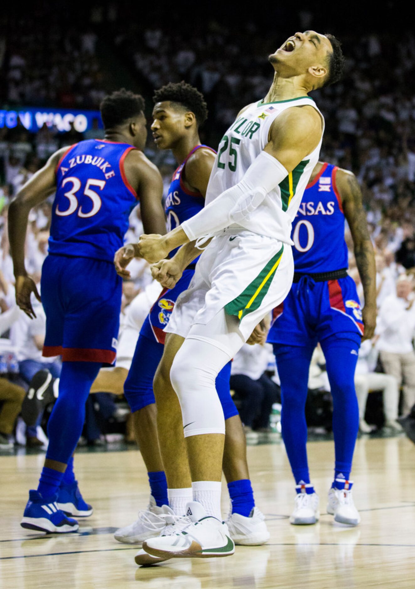 Baylor Bears forward Tristan Clark (25) celebrates a basket during the first half of an NCAA...