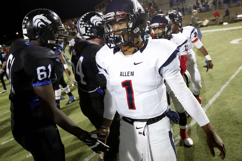 Allen quarterback Kyler Murray (1) greets Plano West players after a high school football...