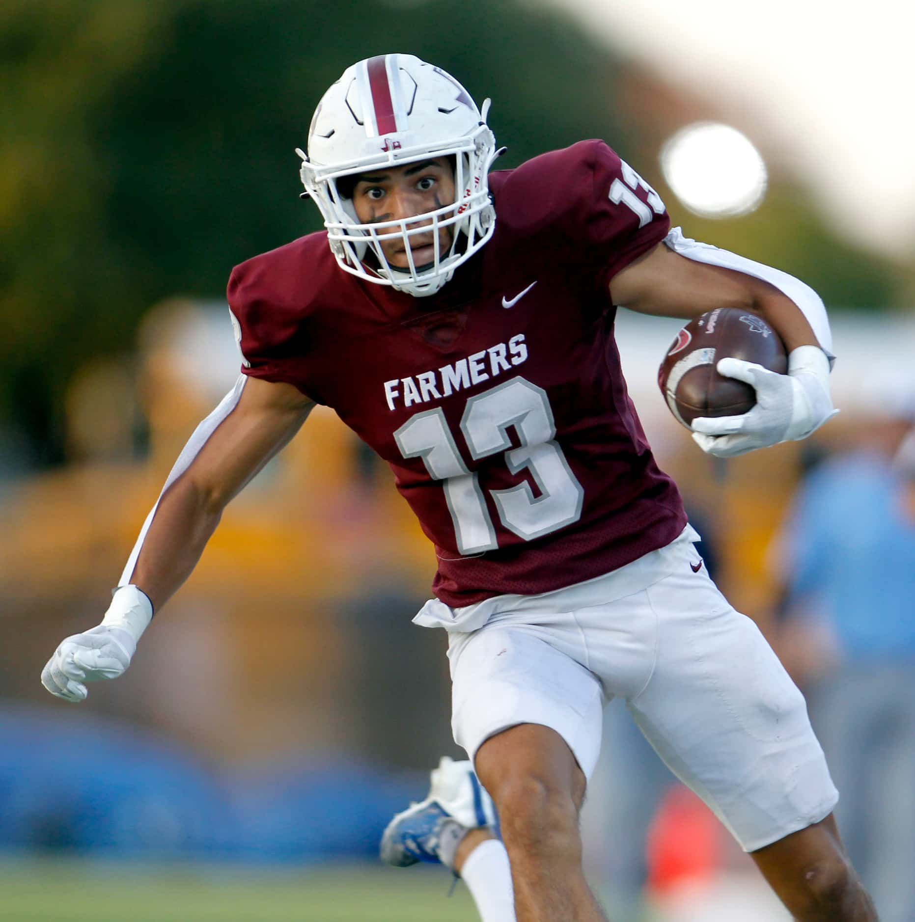 Lewisville receiver JJ Gonzales (13) eyes the end zone en route to a 60-yard touchdown...