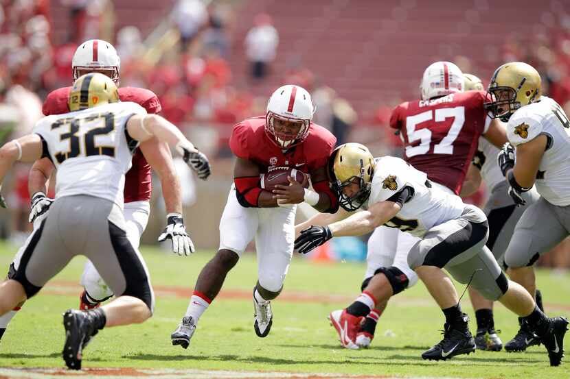 PALO ALTO, CA - SEPTEMBER 13: Barry Sanders #26 of the Stanford Cardinal runs with the ball...