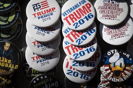 Vendors sell campaign buttons along Euclid Street. 