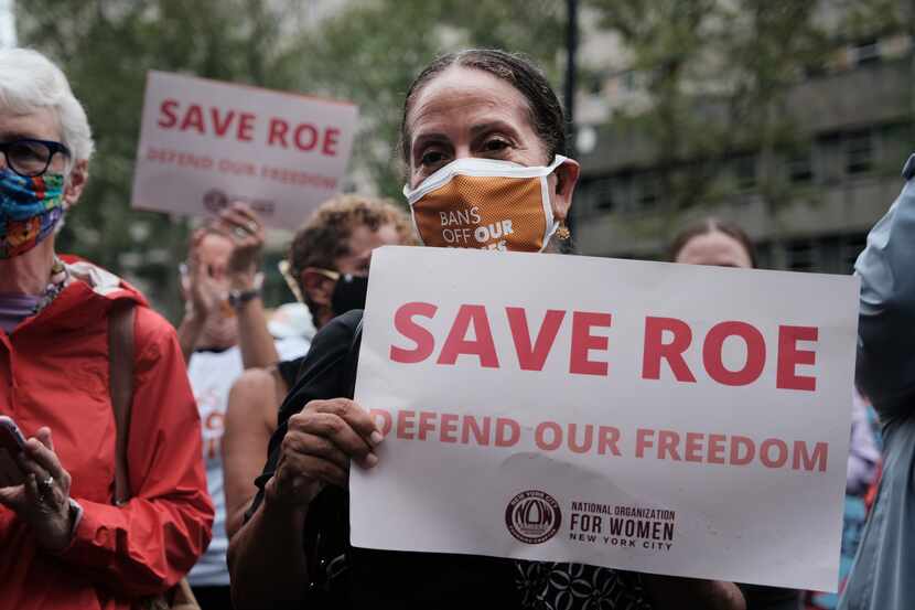 Supporters of abortion rights participate in a rally to denounce Texas' new six-week...