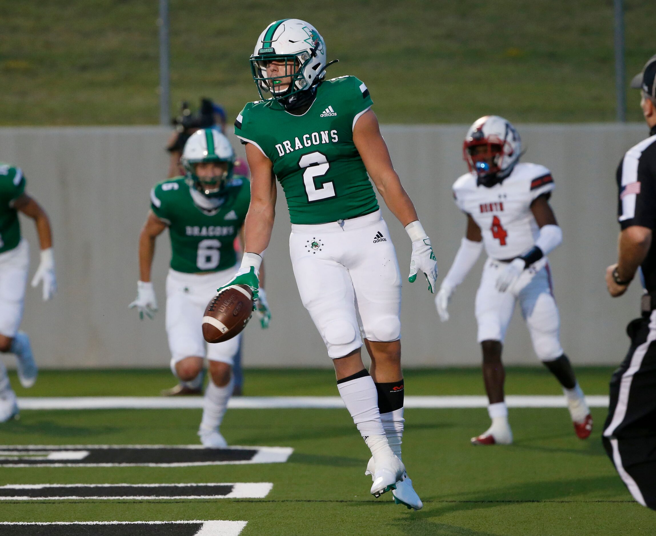 Southlake Carrolls’s Owen Allen (2) celebrates a rushing touchdown against Rockwall Heath...