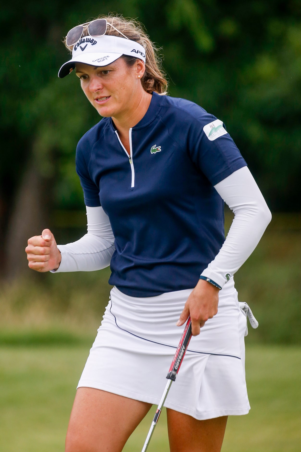 Professional golfer Celine Herbin celebrates a birdie on the No. 12 during the third round...