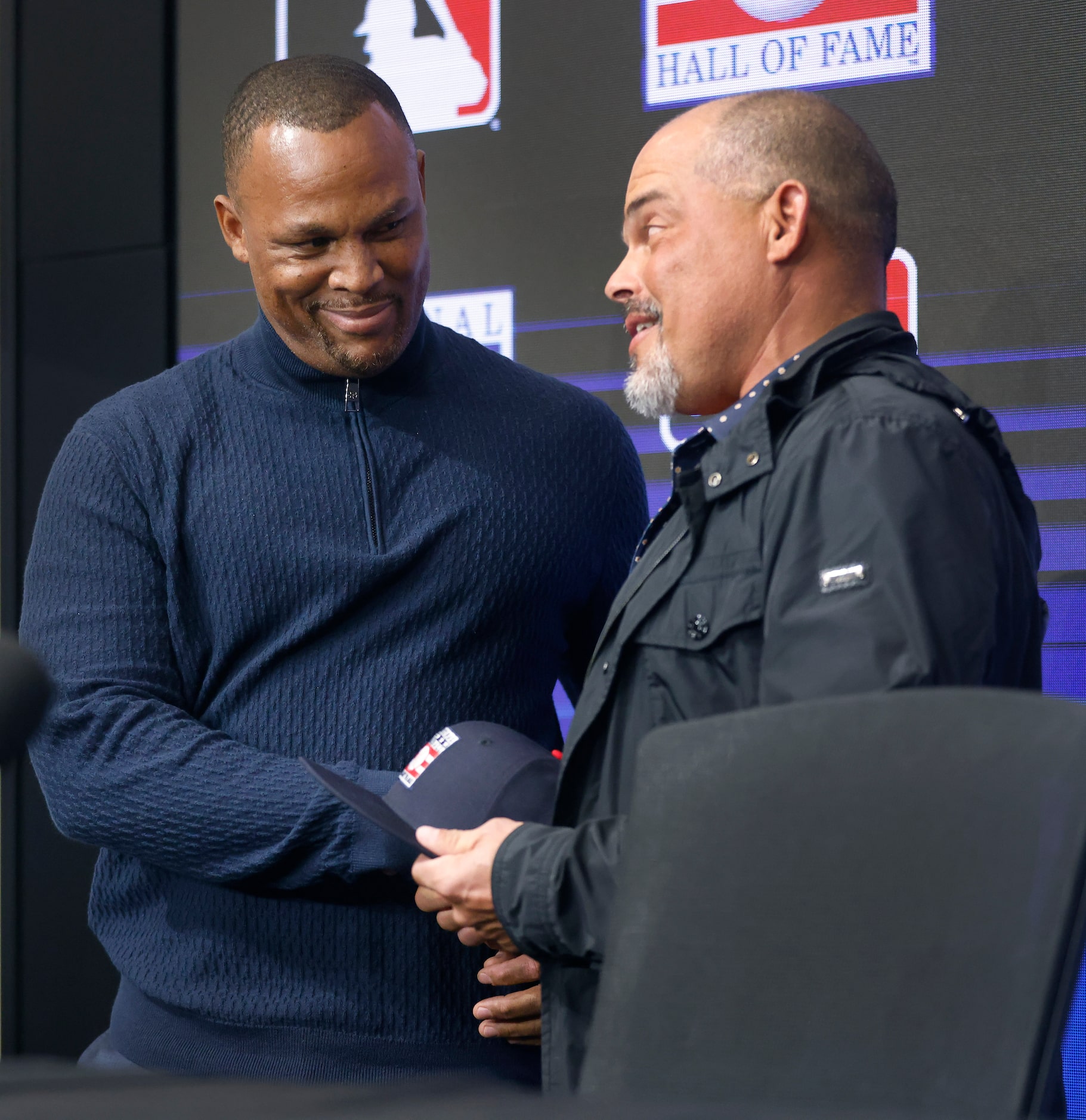 Texas Rangers Hall of Famer Ivan ‘Pudge’ Rodirguez (right) congratulates former Rangers...