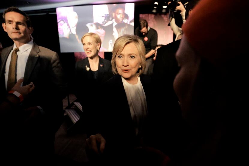  Democratic presidential candidate Hillary Clinton greets people in the audience following...