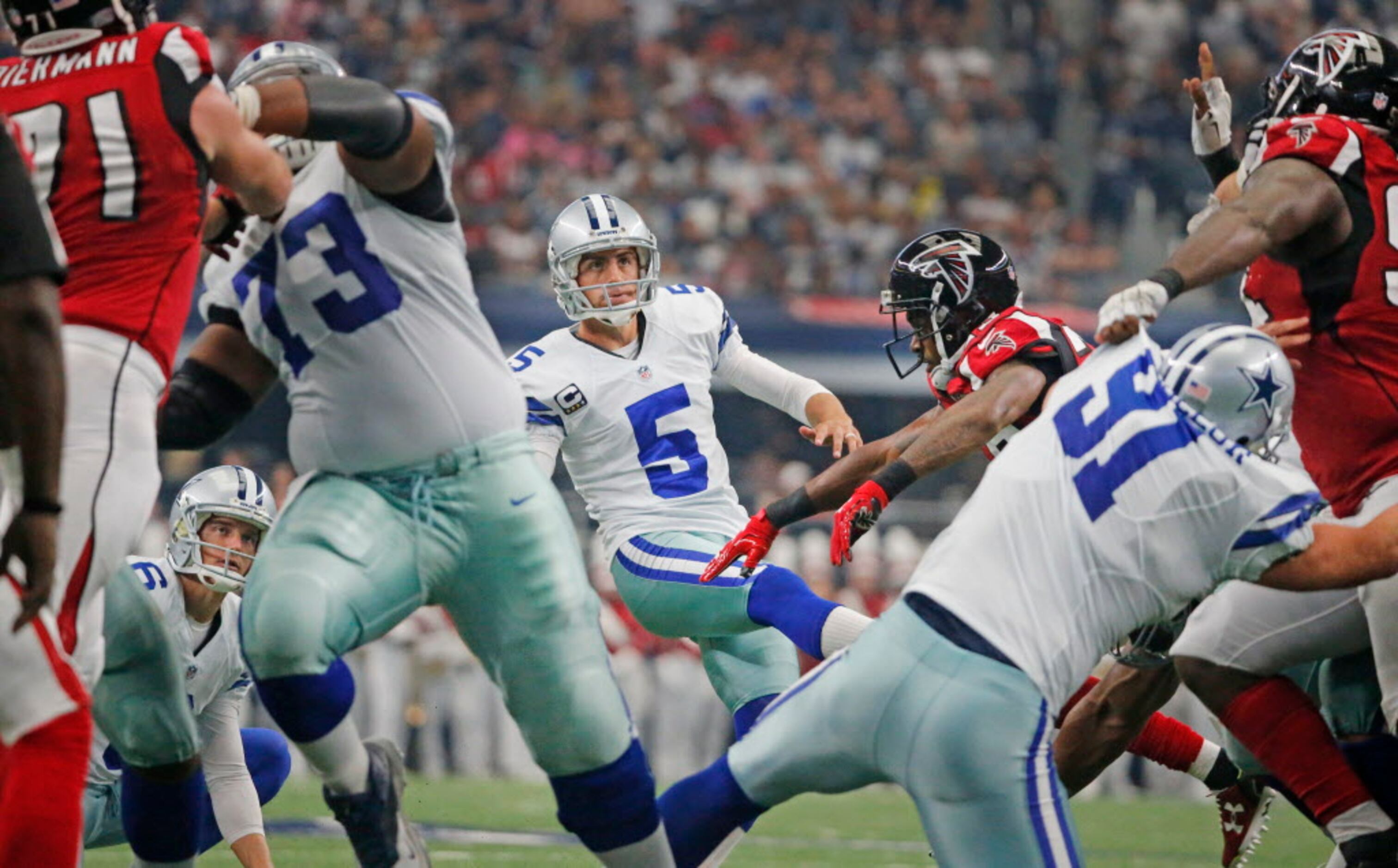 Dallas Cowboys punter Chris Jones (6) and kicker Dan Bailey (5