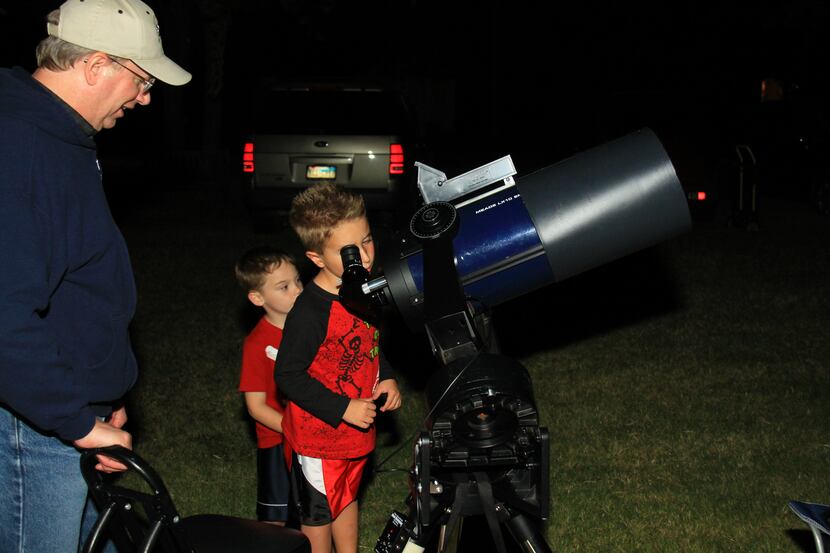 Guests can view the stars through high-powered telescopes provided by the Texas Astronomical...
