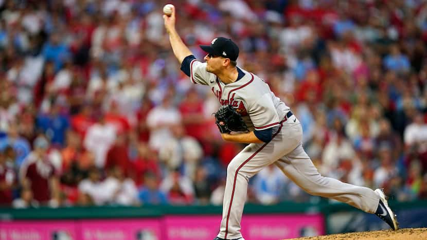 Atlanta Braves' Jake Odorizzi (12) throws during the fourth inning in Game 3 of baseball's...