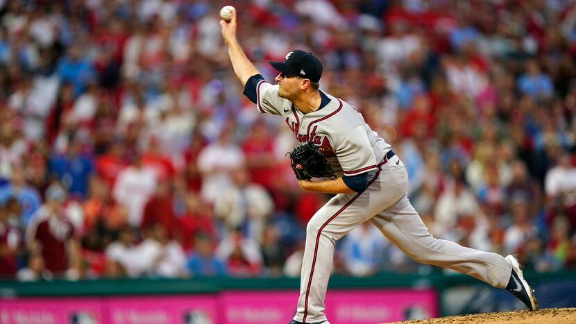 Atlanta Braves' Jake Odorizzi (12) throws during the fourth inning in Game 3 of baseball's...