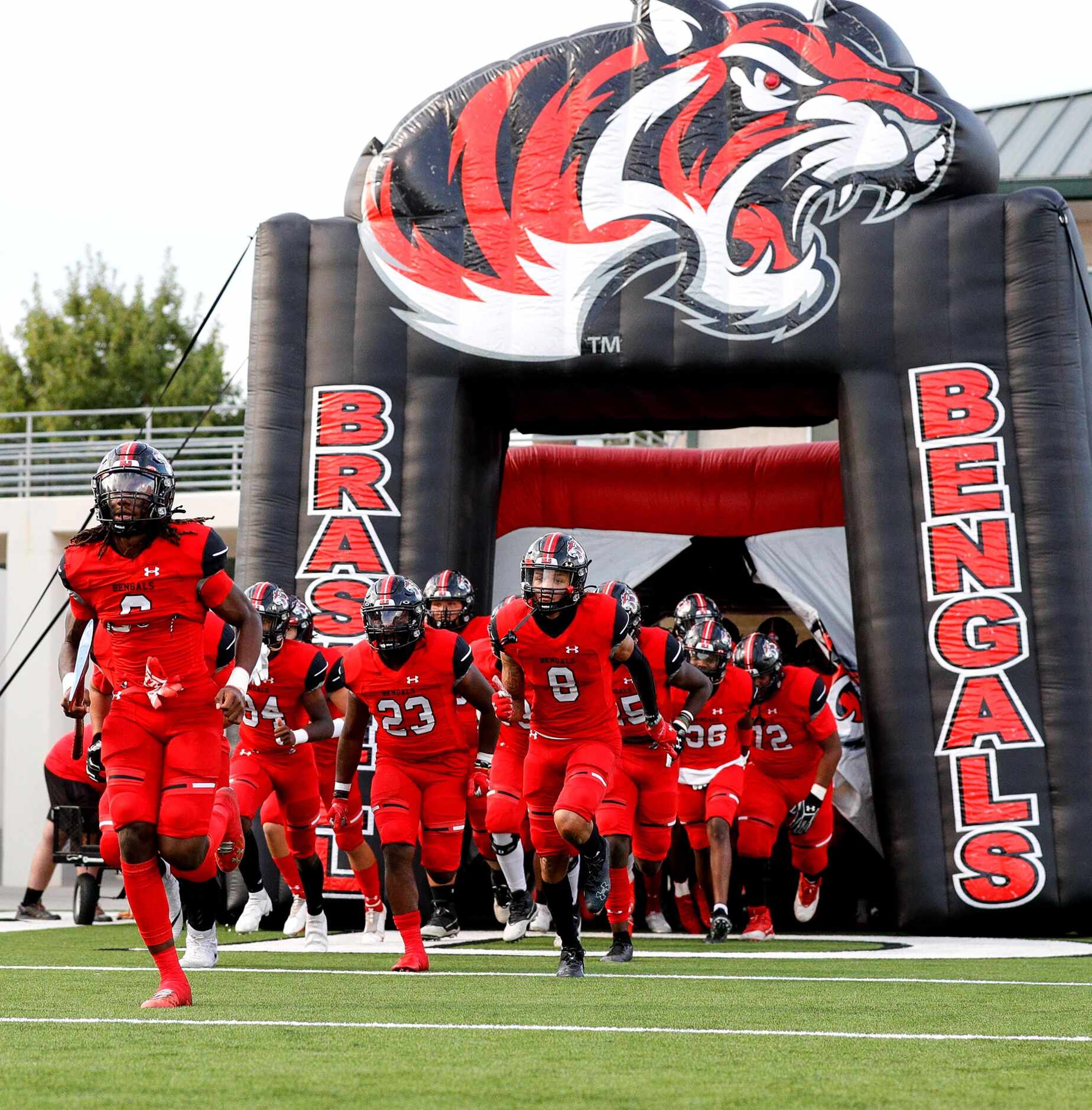The Denton Braswell Bengals enter the field to face McKinney Boyd in a District 5-6A high...