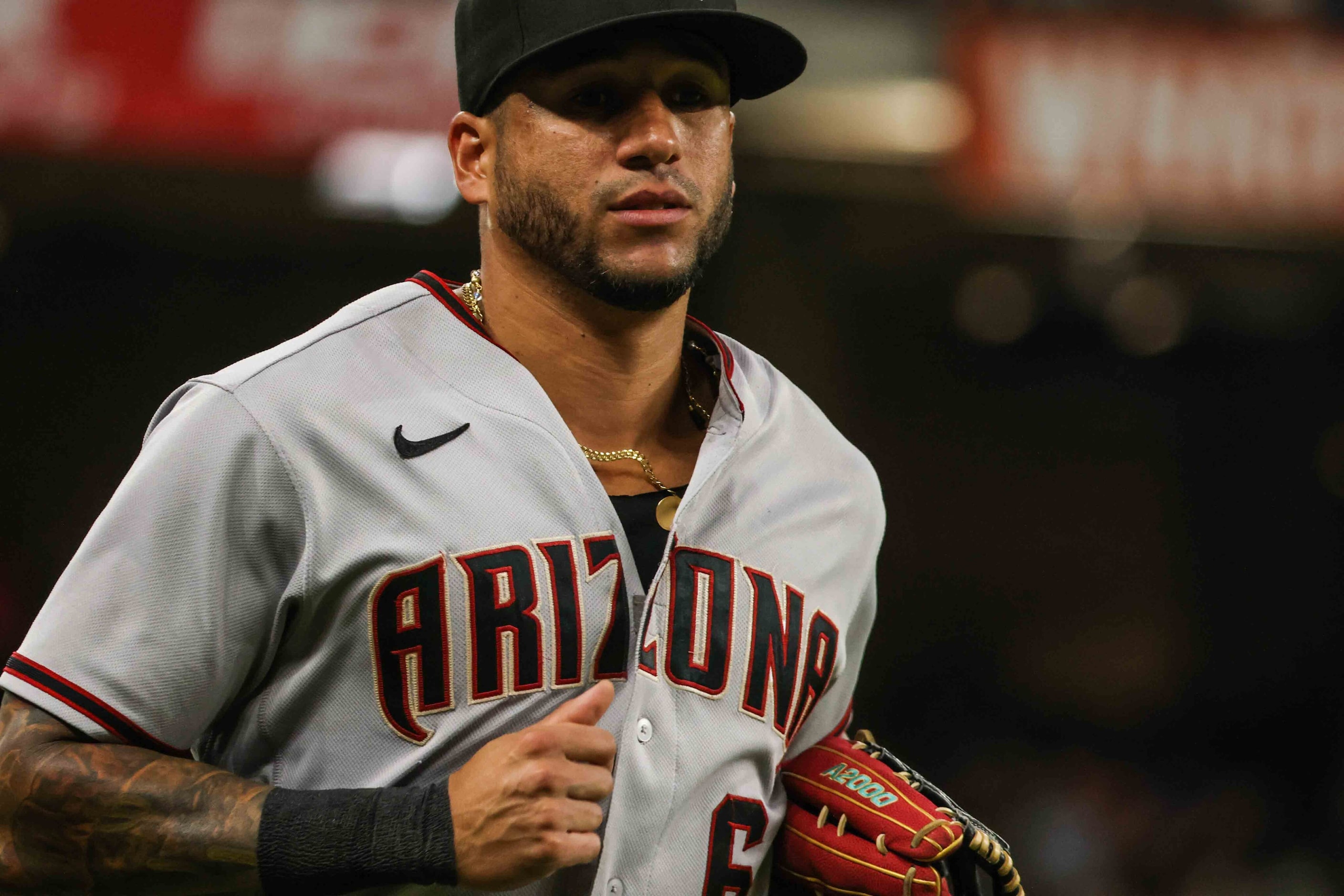 David Peralta (6) goes back to his dugout during Arizona Diamondbacks at Texas Rangers game...