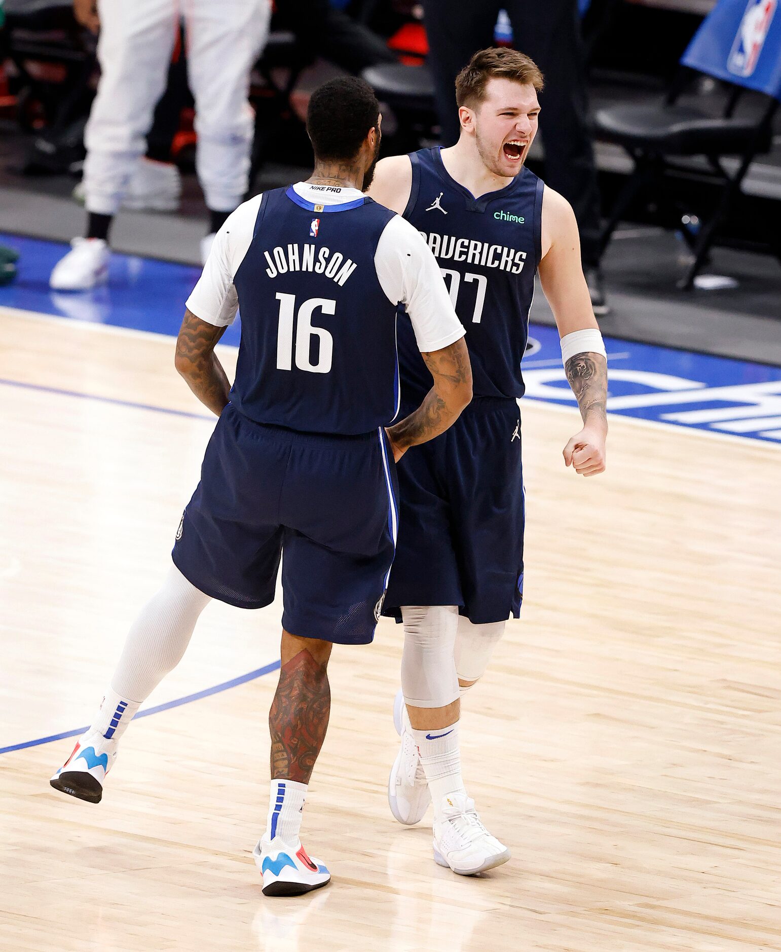 Dallas Mavericks guard Luka Doncic (77) celebrates his game-winning shot with forward James...