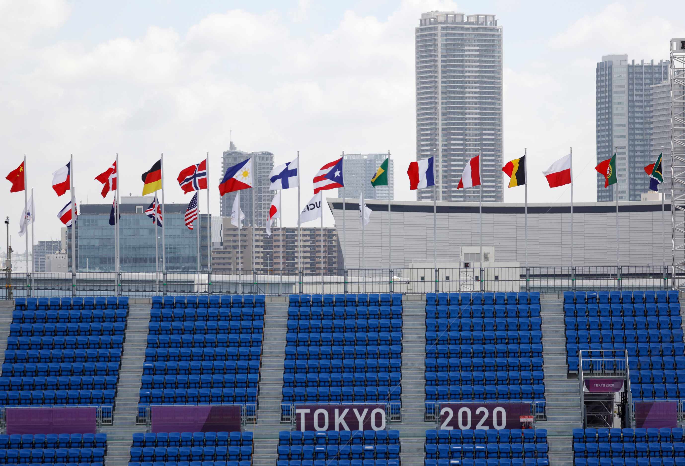 Empty seats are seen against the skyline during the women’s skateboarding prelims at the...