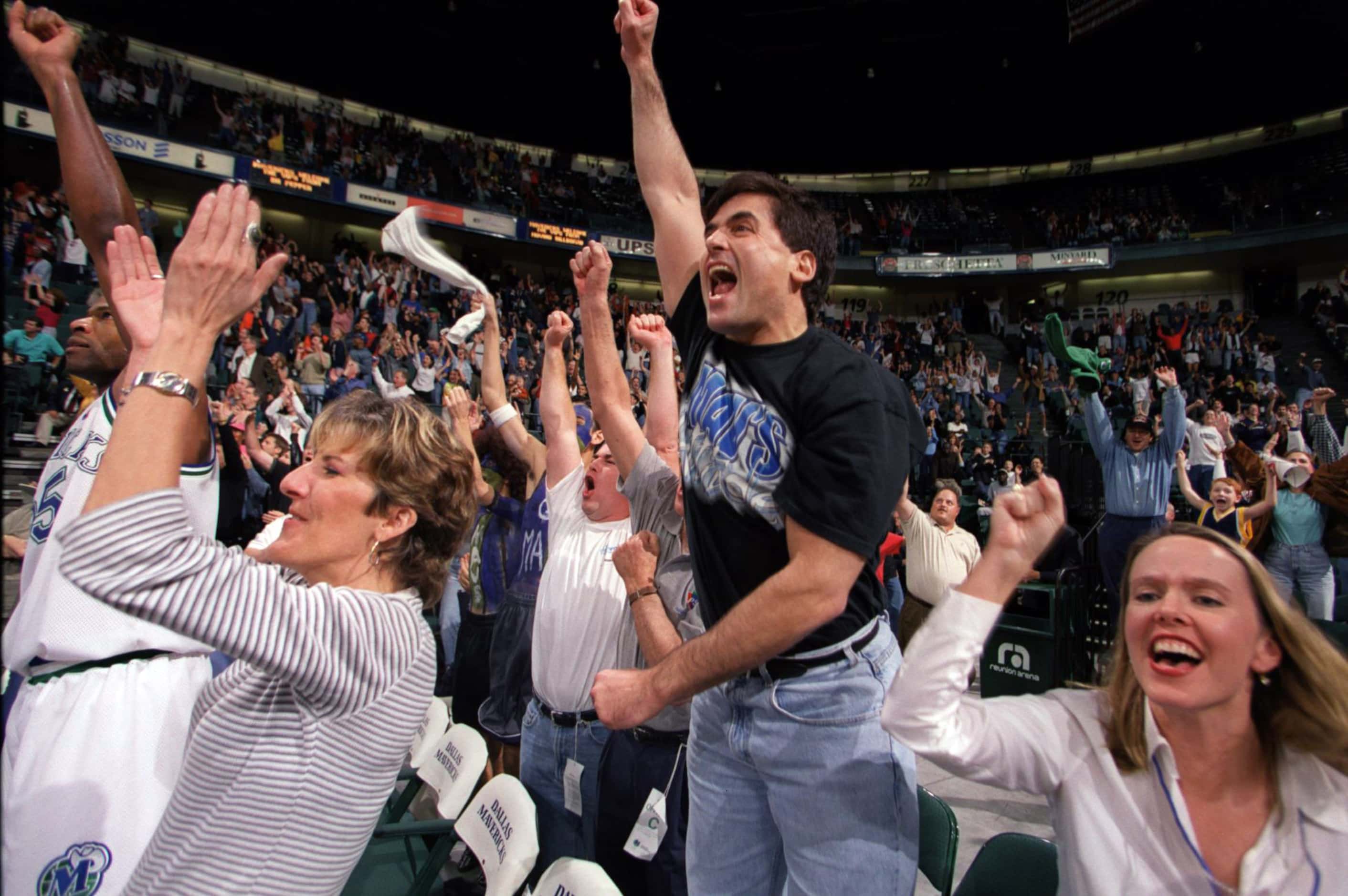 October 20, 2000: Dallas Mavericks owner Mark Cuban jumps for joy during a preseason game...
