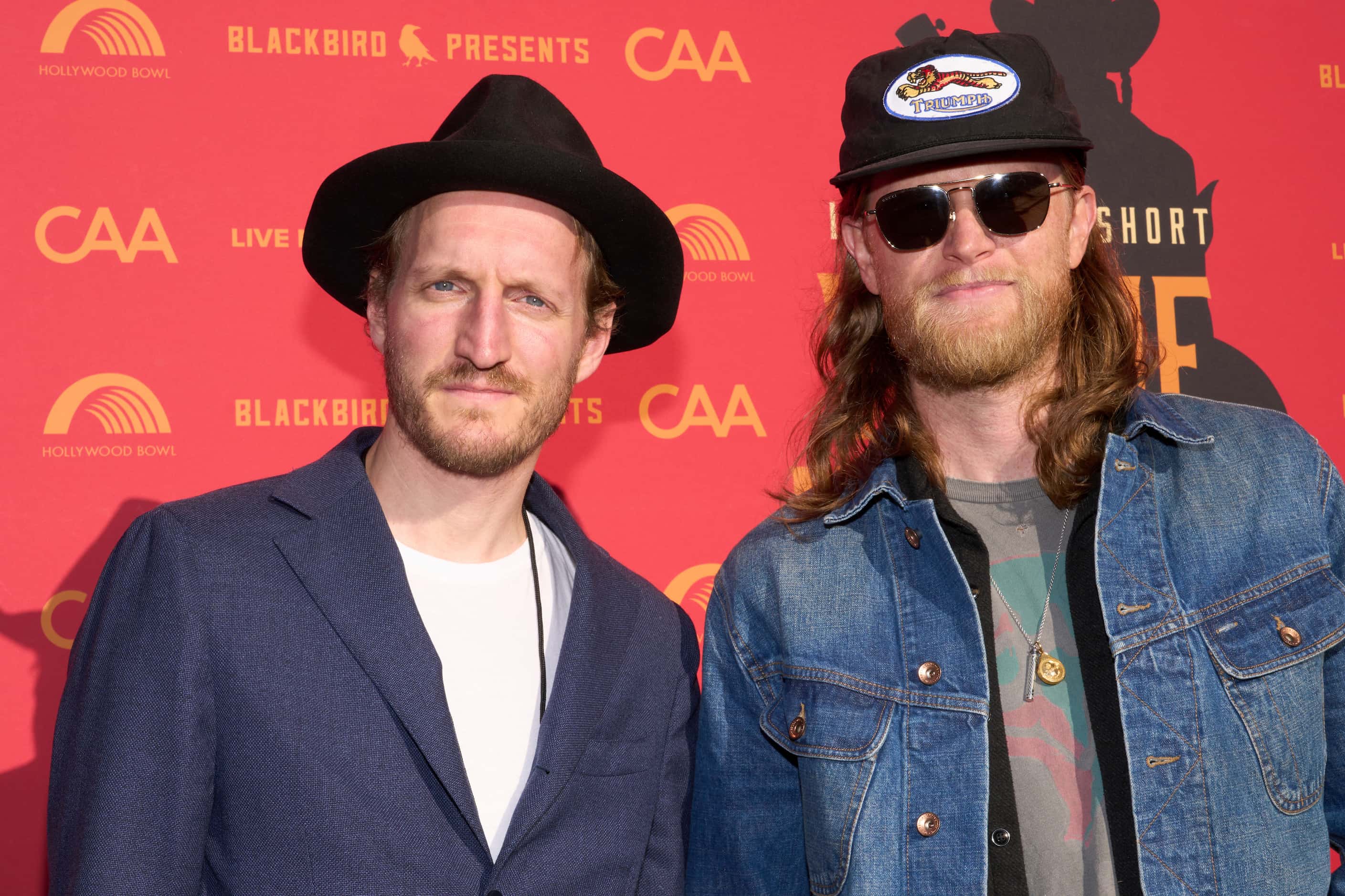 Jeremiah Fraites, left, and Wesley Schultz of The Lumineers arrive at Willie Nelson 90,...