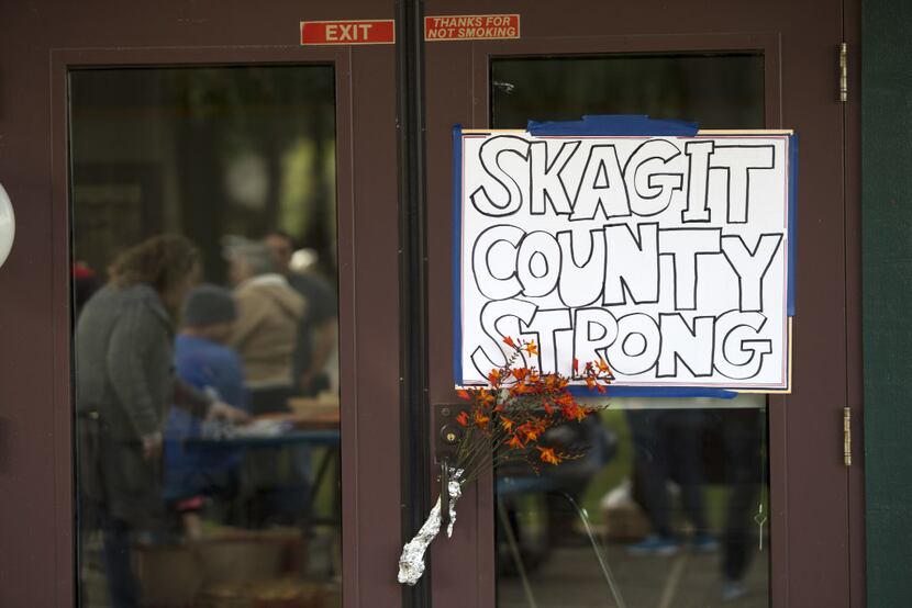 Members of the rural community 60 miles north of Seattle were shaken but finding strength in...