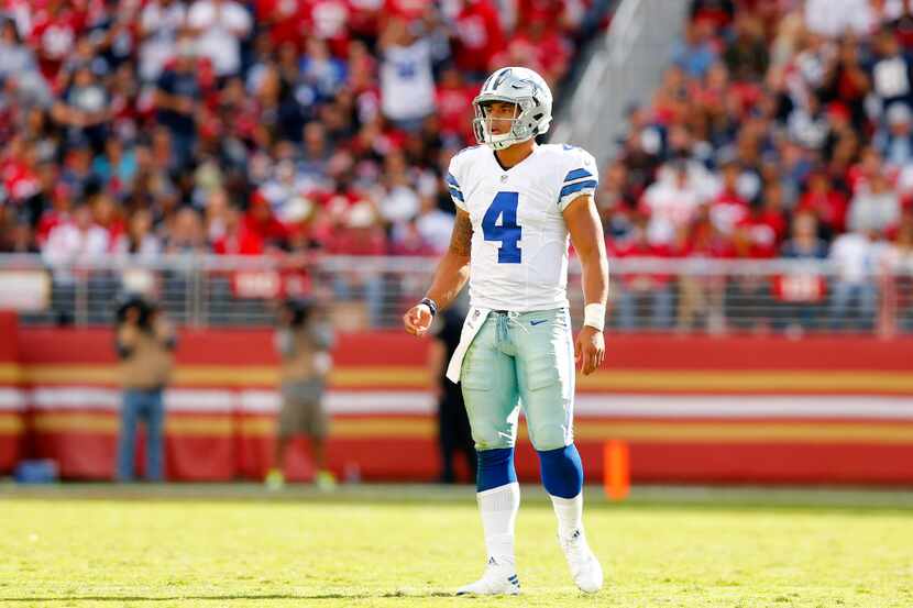 Dallas Cowboys quarterback Dak Prescott (4) looks to the sideline for a play during the...