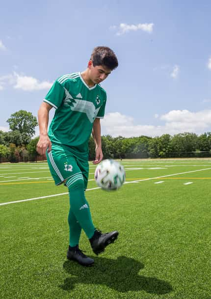 Southlake Carroll senior F/MF Robbie Pino, the 2020 all-area player of the year, kicks a...