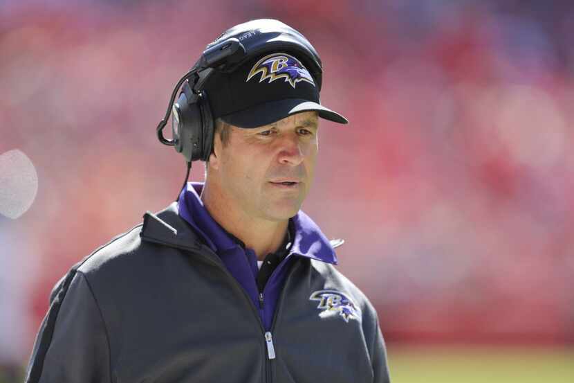 Baltimore Ravens coach John Harbaugh during the first half of an NFL football game against...